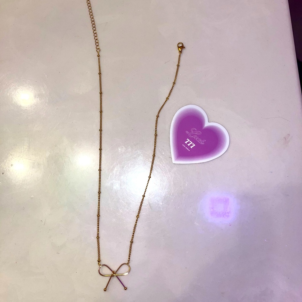 evry jewels bow necklace!!